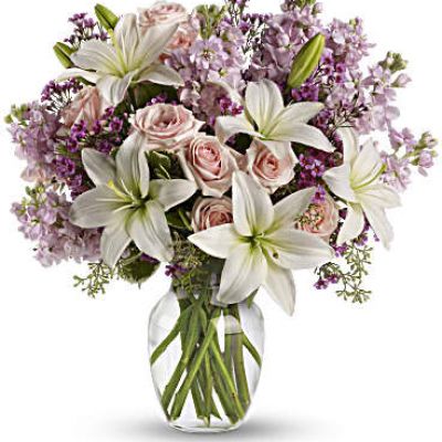 <div id="mark-3" class="m-pdp-tabs-marketing-description">Put your love into the season's most romantic flowers - light pink roses, fragrant white asiatic lilies and other favorites in a dazzling clear glass vase. Love will blossom in the most intoxicating way for a full week. You'll both enjoy it.</div>
 
<div id="desc-3">
<ul>
 	<li>This spectacular bouquet includes light pink spray roses, white asiatic lilies, lavender stock and lavender waxflower accented with assorted greenery.</li>
</ul>
</div>