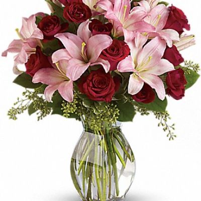 <div class="m-pdp-tabs-description">
<div id="mark-1" class="m-pdp-tabs-marketing-description">Lovely reds and pinks come together in this lavishly romantic anniversary gift. Sweetly sentimental, this combination of colors and flowers is a delightfully fresh way to say "I love you."</div>
</div>
<p id="arrngDescp">Radiant red roses and spray roses along with pretty in pink asiatic lilies are beautifully arranged in a stylish glass vase. It's a beautiful way to celebrate a romance that deepens with each passing year.</p>