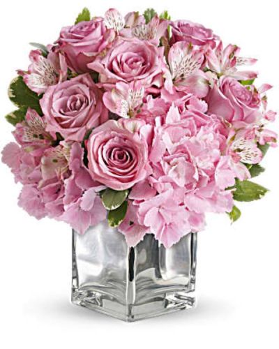 <div id="mark-1" class="m-pdp-tabs-marketing-description">Nothing's too sweet for the sweetest woman in the world. Surprise her with a delightfully dainty bouquet featuring delicate lavender roses and pink hydrangea in a sparkling silver cube vase. You'll make her day, her week, her month!</div>
<p>&nbsp;</p>
<div id="desc-1">
<ul>
<li>The beautiful bouquet includes pink hydrangea, lavender roses and pink alstroemeria accented with fresh greenery.</li>
</ul>
</div>