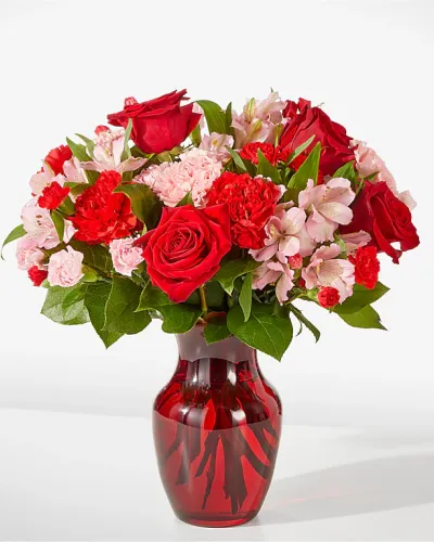 <p>As sweet as candy, this pink and red arrangement is sure to add a sugary rush to their Valentine's Day.</p>