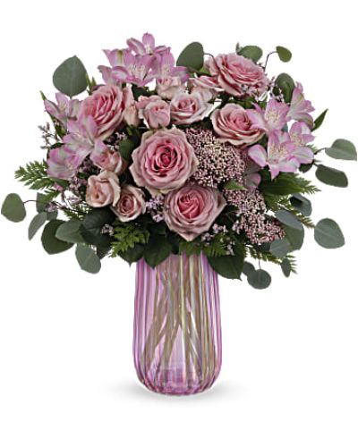 <div id="mark-3" class="m-pdp-tabs-marketing-description">
<div id="mark-3" class="m-pdp-tabs-marketing-description">This Mother's Day…think pink! Beautiful pink roses in a shimmering, iridescent pink glass vase that Mom is sure to love.</div>
<p> </p>
<div id="desc-3">Pink roses, pink spray roses, pink alstroemeria and pink rice flower are arranged with leatherleaf fern, pink limonium and silver dollar eucalyptus.</div>
</div>