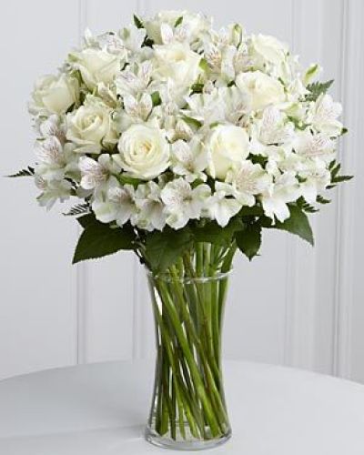 <p>The FTD® Cherished Friend™ Bouquet offers comfort and sympathy in the time of grief and loss. Bright white roses and Peruvian lilies are accented by lush greens and gorgeously arranged in a clear glass gathering vase to create a bouquet that will bring peace and show how much you care.</p>