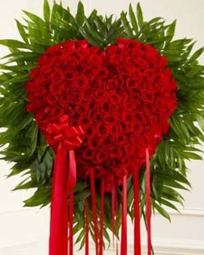 <p>When words aren't enough to express the depths of your love, this heart-shaped arrangement makes an unforgettable statement and stunning tribute. This standing spray arrangement is expertly crafted from fresh red roses. Traditionally delivered directly to the funeral home.</p>