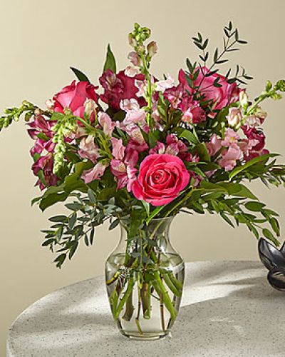 <p>Fairytale-pink roses, hot pink alstroemeria, and pink snapdragons make an enchanting bouquet fit for any princess. </p>