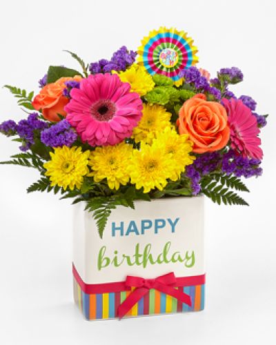 <div class="summary entry-summary">
<div class="woocommerce-product-details__short-description">
The FTD® Birthday Brights™ Bouquet is a true celebration of color and life to surprise and delight your special recipient on their big day! Hot pink gerbera daisies and take center stage surrounded by purple gilly flowers, yellow chrysanthemums, orange carnations, green button poms, bupleurum, and lush greens to create party perfect birthday display. Presented in a modern rectangular ceramic vase with colorful striping at the bottom, “Happy Birthday” lettering at the top, and a bright pink bow at the center, this unforgettable fresh flower arrangement is then accented with a striped happy birthday pick to create a fun and festive gift.
</div>
</div>
<div class="woocommerce-tabs wc-tabs-wrapper">
</div>