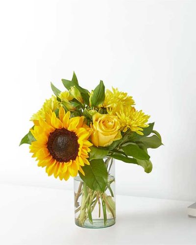 <p>Feel like someone's cheering you on with bright sunflowers, roses, and alstroemeria.</p>