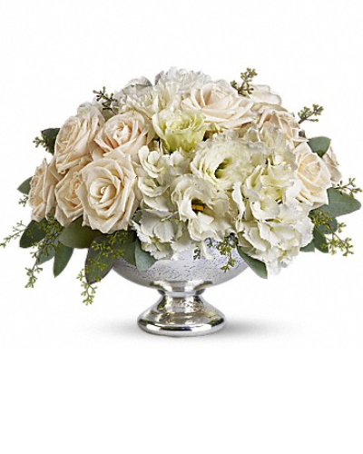 <div class="m-pdp-tabs-description">
<div id="mark-1" class="m-pdp-tabs-marketing-description">Treat your guests to elegance with this dazzling arrangement of crème roses, white hydrangea and white lisianthus presented in a brilliant vase. It's a lovely choice for any special occasion, from weddings to anniversaries.</div>
</div>
<p id="arrngDescp">This arrangement presents a soft mix of crème roses, white hydrangea and white lisianthus accented with seeded eucalyptus.</p>