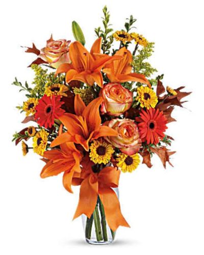 Feel the crisp beauty of fall with this wonderful bouquet.
This luscious arrangement is filled with a gorgeous assortment of autumnal hues, sure to delight your recipient with this dazzling array of rich colors and textures.