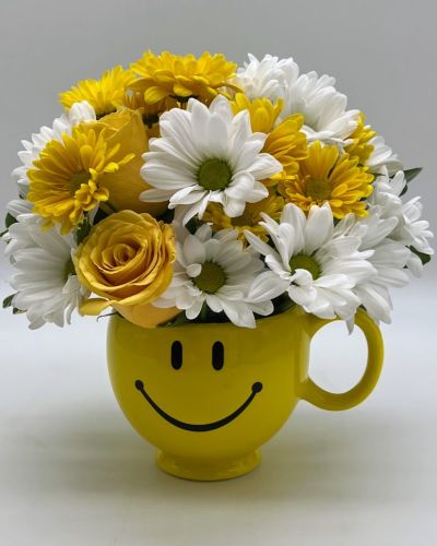Whatever the occasion may be, send them this little bundle of floral happiness and let them know that you're thinking of them,wishing them happiness, love and joy!