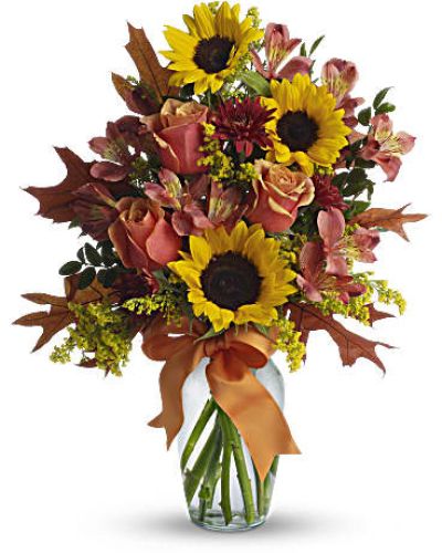 <div id="mark-1" class="m-pdp-tabs-marketing-description">This ravishingly rustic bouquet is like a burst of country charm. Complementing the sunny sunflowers are orange bi-color roses and orange and rust chrysanthemums - all delightfully tied up with a bright orange ribbon. Absolutely irresistible.</div>
<p> </p>
<div id="desc-1">The cheerful arrangement includes orange bi-color roses, yellow sunflowers, dark orange alstroemeria and rust cushion spray chrysanthemums accented with orange ribbon and assorted greenery.</div>