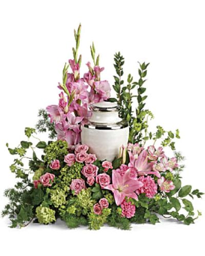 <div class="m-pdp-tabs-description">
<div id="mark-1" class="m-pdp-tabs-marketing-description">Surround the cremation urn with gorgeous, graceful pink blooms that show deep gratitude for a beautiful life.</div>
</div>
<p id="arrngDescp">This pretty arrangement includes miniature green hydrangea, pink spray roses, pink asiatic lilies, pink alstroemeria, pink gladioli, pink carnations, green carnations, bupleurum, green ivy, myrtle, ming fern, and lemon leaf.</p>
Arrangement does not include urn.