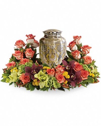 <div class="m-pdp-tabs-description">
<div id="mark-1" class="m-pdp-tabs-marketing-description">A rich and subtly hued garden expresses sympathy most thoughtfully, in a gentle oval arrangement that honors and embraces a cherished memory.</div>
</div>
<p id="arrngDescp">Orange roses blend with other beautiful flowers such as stems of cymbidium orchids, gladioli, chrysanthemums, hypericum and other delicate greens.</p>
Please note: Arrangement does not include urn.