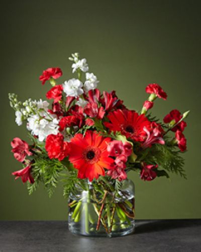<div class="row">
<div class="truncated">

The Big Red Bow bouquet will add the perfect finishing touch to any room's holiday d&eacute;cor. Let the cherry red gerbera daises steal the show while the white stock adds balance and softens the vibrant arrangement.

</div>
</div>

<div id="accordion-container" class="product-detail-step-one product-page">
<div id="accordion" class="panel-group">
<div class="panel panel-default">
<div class="panel-heading">
<h4 class="panel-title"></h4>
</div>
</div>
</div>
</div>