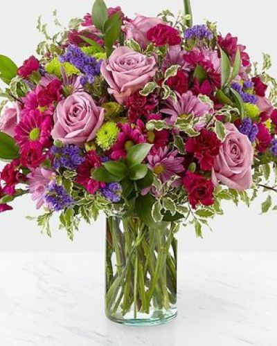 Dazzle your loved ones with stunning violet and green hues set within a glass cylinder vase. A collection of roses, daisies and statice, our Sweet Nothings Bouquet sends sweet sentiment deep within each bloom.
STANDARD
C Quantity Color Description
2 Lavender 50 cm Standard Rose
2 Green Button Pom
2 Lavender Daisy Pom
3 Purple Daisy Pom
3 Magenta Miniature Carnation
1 Purple Filler - Sinuata Statice
4 Green Green - Israeli Ruscus
2 Varigated Green - Pittosporum Italian
DELUXE
C Quantity Color Description
6 Lavender 50 cm Standard Rose
3 Green Button Pom
3 Lavender Daisy Pom
4 Purple Daisy Pom
4 Magenta Miniature Carnation
2 Purple Filler - Sinuata Statice
4 Green Green - Israeli Ruscus
2 Varigated Green - Pittosporum Italian
PREMIUM
C Quantity Color Description
8 Lavender 50 cm Standard Rose
4 Green Button Pom
4 Lavender Daisy Pom
5 Purple Daisy Pom
6 Magenta Miniature Carnation
3 Purple Filler - Sinuata Statice
6 Green Green - Israeli Ruscus
2 Varigated Green - Pittosporum Italian