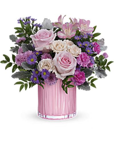 <ul id="tabs-pdp" class="nav nav-tabs" data-tabs="tabs"></ul>
<div id="tabs-pdp-content" class="tab-content">
<div id="description" class="tab-pane fade active" role="tabpanel" aria-labelledby="descriptionTab">
<div id="mark-3" class="m-pdp-tabs-marketing-description">Rosy, radiant and perfectly posh! Rosy Pink with a fabulously feminine arrangement in a pearlescent pink glass vase with sculpted details is the perfect Mother's Day surprise.</div>
<p> </p>
<div id="desc-3">Pink roses, pink spray roses, pink alstroemeria, miniature hot pink carnations, lavender button spray chrysanthemums and large purple monte cassino asters are arranged with dusty miller and huckleberry.</div>
</div>
</div>