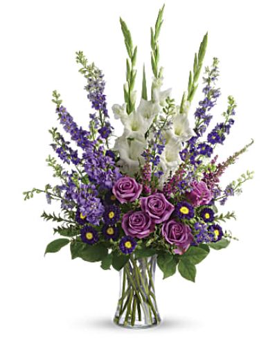 <div class="m-pdp-tabs-description">
<div id="mark-1" class="m-pdp-tabs-marketing-description">Lavender and white flowers make a grand statement in this bouquet. Cherish your memories with this display of lavender larkspur and roses, deep purple asters, pure white gladioli and the softest pink heather.</div>
</div>